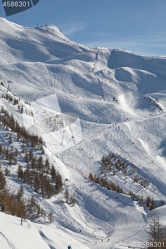 Image of Skiing slopes, snowy Alpine landscape