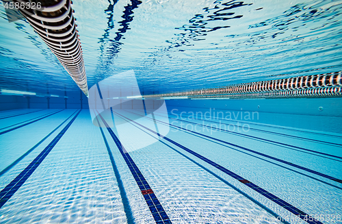 Image of Olympic Swimming pool under water background.