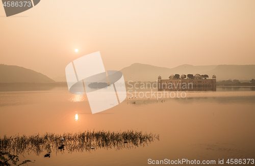 Image of Jal Mahal (meaning Water Palace) is a palace in the middle of th