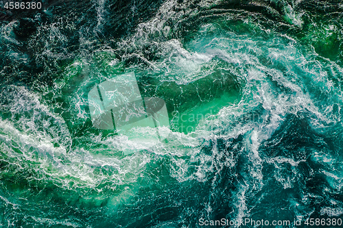 Image of Abstract background. Waves of water of the river and the sea mee