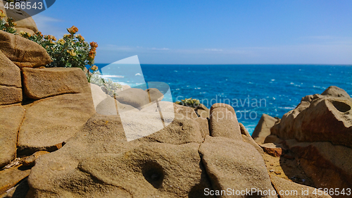 Image of Beautiful azure sea and the rocky beach