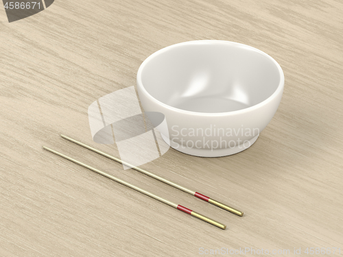 Image of Empty bowl and wooden chopsticks