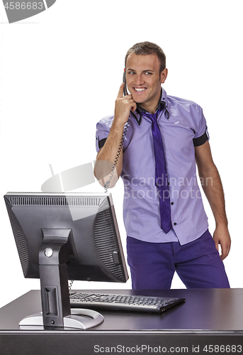 Image of Young Businessman on the Phone