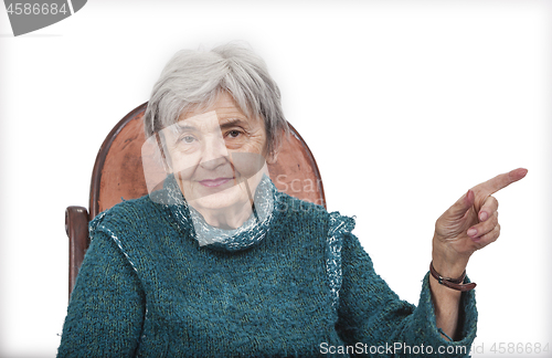 Image of Old Woman Pointing her Finger to Something