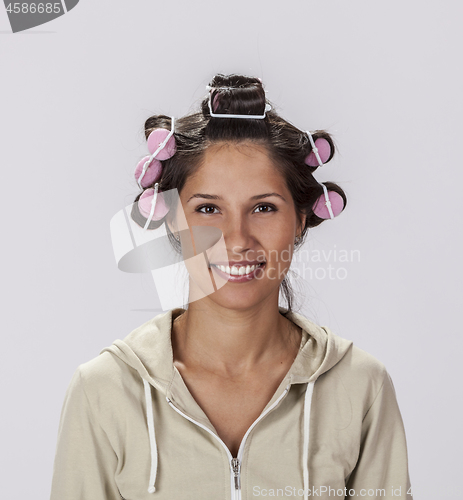 Image of Portrait of a Woman with Curlers