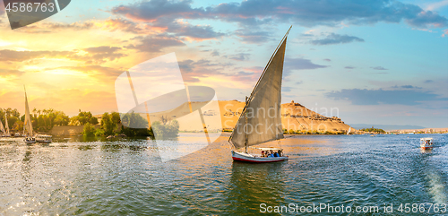 Image of Sailboat at sunset