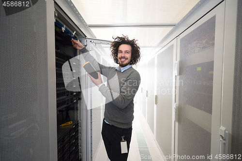 Image of technician using digital cable analyzer