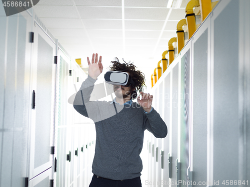 Image of IT engeneer using virtual reality headset