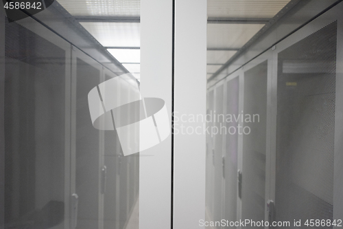 Image of modern server room with white servers