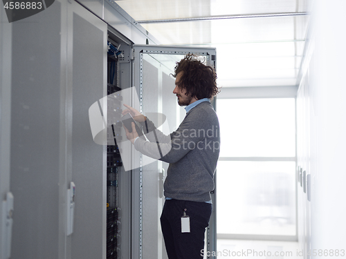 Image of technician using digital cable analyzer