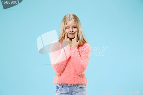 Image of Beautiful teen girl looking suprised and bewildered