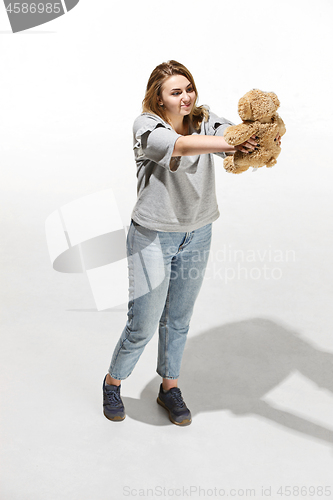 Image of Photo of pretty woman hug cute soft toy, closeup portrait of pretty female with teddy bear