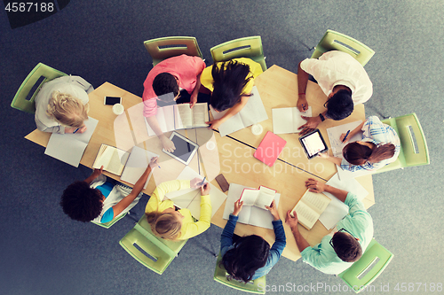 Image of group of students with tablet pc at school library