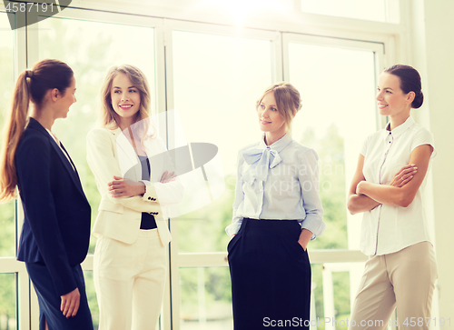 Image of business women meeting at office and talking