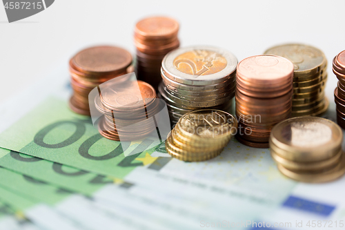 Image of close up of euro coins and paper money banknotes