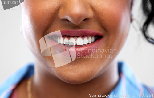 Image of close up of african american woman white teeth