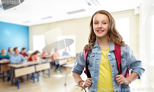 Image of happy smiling teenage student girl with school bag