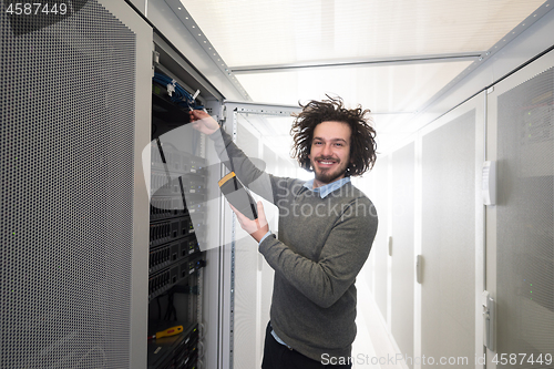 Image of technician using digital cable analyzer