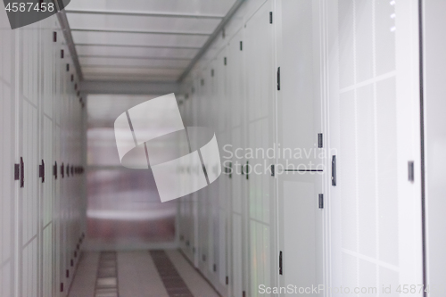 Image of modern server room with white servers