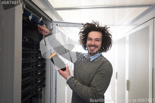 Image of technician using digital cable analyzer