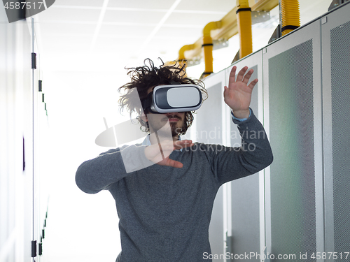 Image of IT engeneer using virtual reality headset