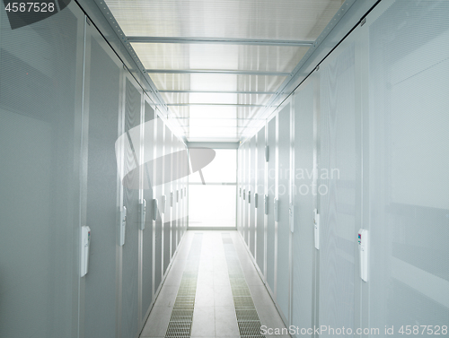 Image of modern server room with white servers