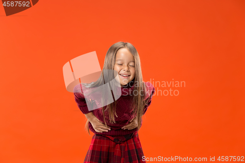 Image of The happy teen girl standing and smiling