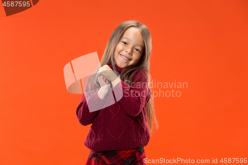 Image of The happy teen girl standing and smiling