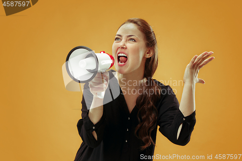 Image of Woman making announcement with megaphone