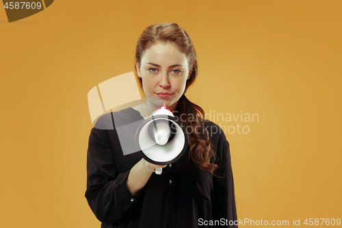 Image of Woman making announcement with megaphone