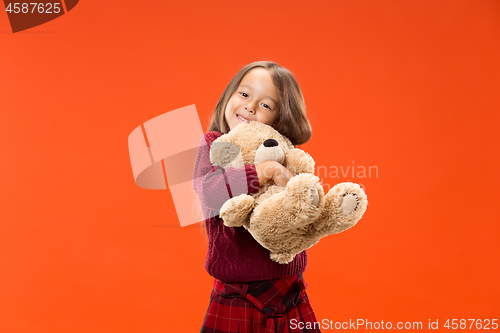 Image of The happy teen girl standing and smiling