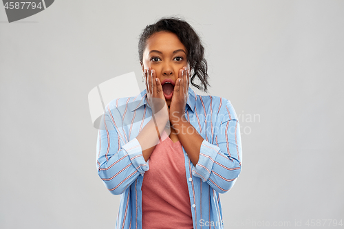 Image of shocked african american woman with open mouth