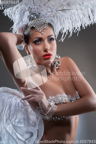 Image of Young Woman In Feather 