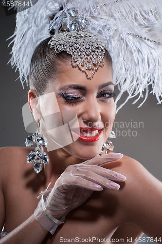 Image of Young Woman In Feather 