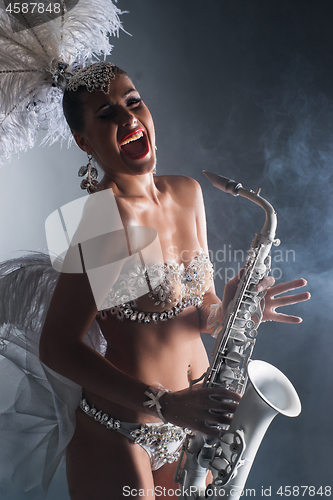 Image of Young Woman In Feather 