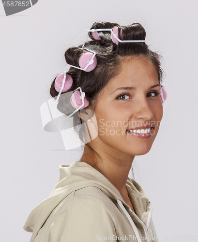 Image of Portrait of a Woman with Curlers