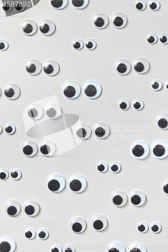 Image of Creative pattern from plastic googly eyes.