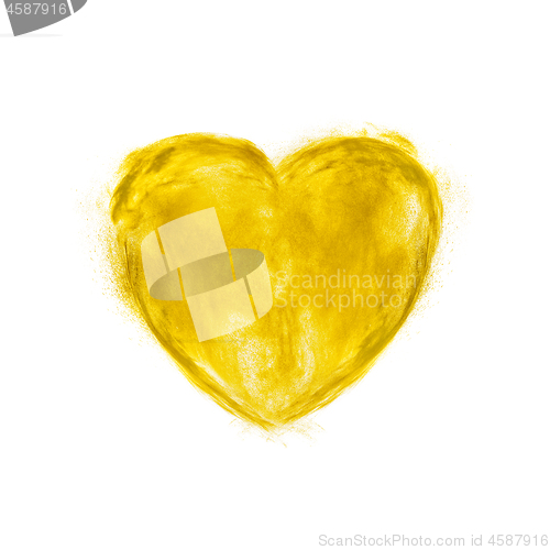 Image of Yellow powder explosion in the shape of heart.