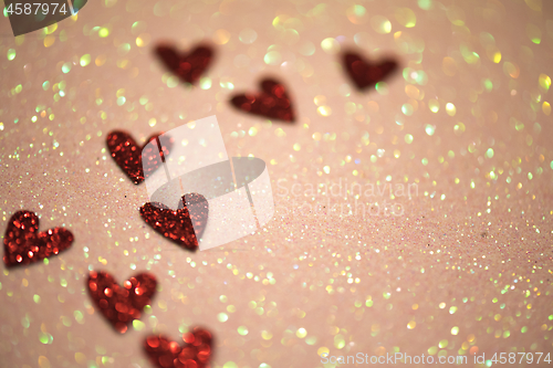 Image of Hearts over abstract background with bokeh