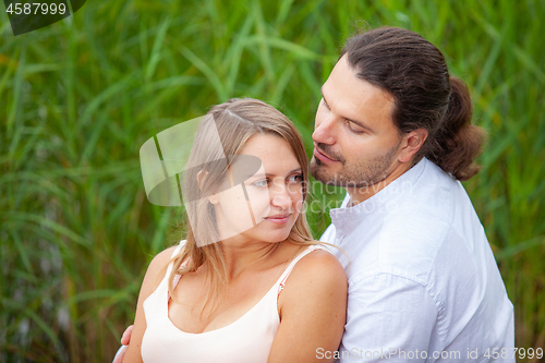 Image of A young man and a pregnant woman