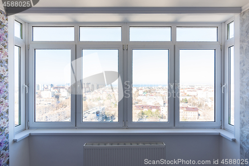 Image of plastic windows in the renovated room