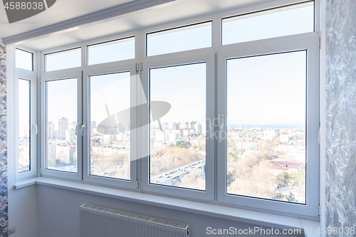 Image of View of new plastic windows in the apartment with new repairs