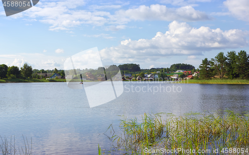 Image of Village Landscape With Lake On A Sunny Day