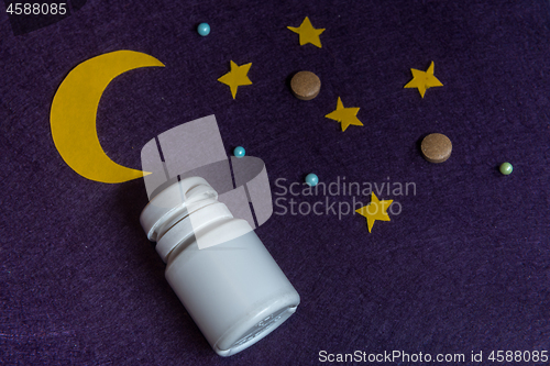 Image of Sky with moon and stars and sleeping pills