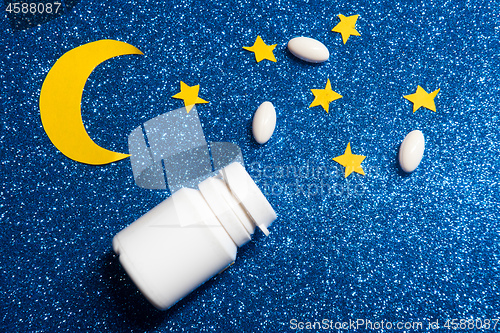 Image of Sky with moon and stars and sleeping pills