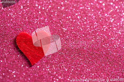 Image of Heart over pink abstract background with bokeh