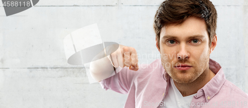 Image of angry young man ready for fist punch