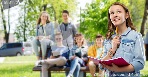 Image of teenage student girl with diary or notebook