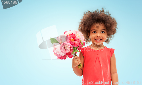 Image of happy little african american girl with flowers