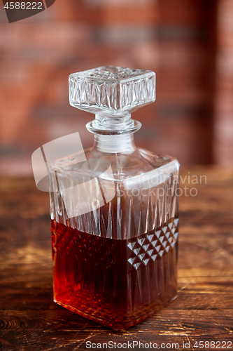 Image of Elegant carafe filled with whiskey, bourbon or rum
